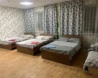 Кровать в общем 4-местном номере. Гостевой дом Гостевой дом Твой Oтель Томск