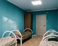Кровать в общем 4-местном номере. Хостел Хостел ЭкоСтройСервис Новый Уренгой