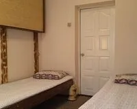 Двухместный номер с 2 кроватями, общим душем и туалетом. Гостевой дом Гостевой дом Территория Мира деревня Скриплево