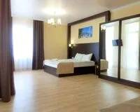 Четырехместный номер с балконом. Мини-отель Мини-отель Alpen House Геленджик