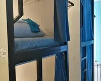 Кровать в общем 6-местном номере для мужчин. Хостел Капсульный хостел Норка Новосибирск