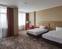 Двухместный номер «Люкс» с 2 раздельными кроватями. Отель Отель Ramada by Wyndham Rostov on Don Hotel and SPA Ростов-на-Дону