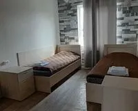 Двухместный номер с 2 кроватями, общим душем и туалетом. База отдыха Загородный клуб Ковчег Гатчина
