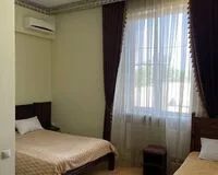 Семейный номер 3-местный. Отель Отель Старый Замок Белореченск