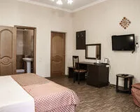 Четырехместный номер с балконом. Мини-отель Мини-отель Strass Hotel Геленджик
