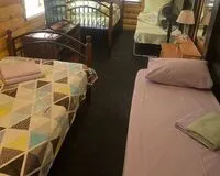 Кровать в общем 8-местном номере. Мини-отель Мини-отель Усадьба 50 Иркутск