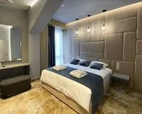 Четырехместный номер с душем и туалетом. Отель Отель Loft Hotel & Spa Белгород