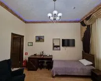 Семейный номер 4-местный с душем и туалетом. Отель Отель Старый Замок Белореченск