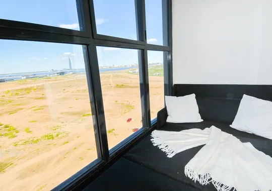 Апартаменты Апартаменты Aelita.Apartments с камином и джакузи. Вид на Порт и Лахта-Центр Санкт-Петербург без отзывов 5% скидка по промокоду!