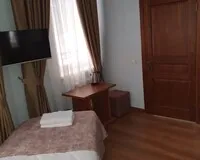 Трехместный номер «Стандарт» Мини-отель Мини-отель Castle курортный посёлок Домбай Забронируй по своей цене!