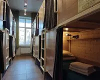 Кровать в общем 12-местном номере для мужчин Хостел Хостел Bird House Hostel Иркутск 5% скидка по промокоду!