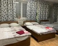 Кровать в общем 4-местном номере Гостевой дом Гостевой дом Твой Oтель Томск новый объект