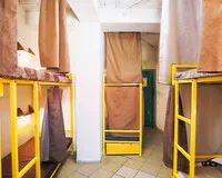 Кровать в общем 6-местном номере для мужчин Хостел Решетников SibHome Иркутск Забронируй по своей цене!