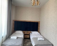 Двухместный номер с 2 кроватями, душем и туалетом Отель Hotel Platan Дербент без звезд