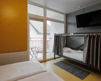 Трехместный номер с балконом Хостел Хостел Hostel Bed Idea Калининград 5% скидка по промокоду!