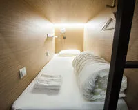 Одноместная капсула общая Хостел Хостел Buran Capsule Hotel Москва метро Чкаловская