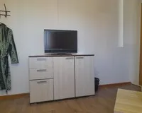 Трехместный номер с душем и туалетом Мини-отель Мини-отель Брусника Северодвинск