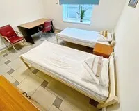 Двухместный номер с 2 кроватями, общим душем и туалетом Хостел Хостел Невский Калининград рейтинг 4.6