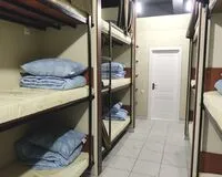 Кровать в общем 6-местном номере для мужчин Хостел Хостел Магония Москва Забронируй по своей цене!
